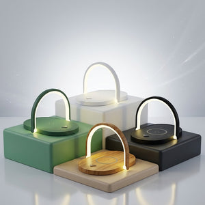 Four modern LED night lights with arched light bars, shown in green, white, black, and wood-grain finishes, each mounted on a matching rectangular base.